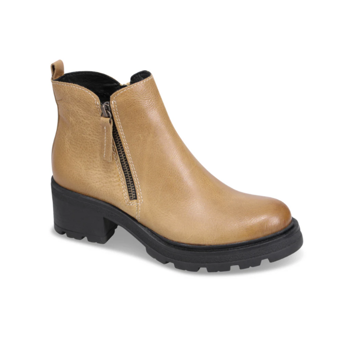 Yellow ankle boot with side zipper, pull tab and black lugged outsole.