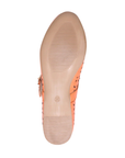 Tan light treaded outsole of Mary Jane.