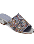 Women's Django & Juliette Tammy heeled slide sandal in silver with multicolor beaded upper and low block heel, ideal for stylish summer wear.