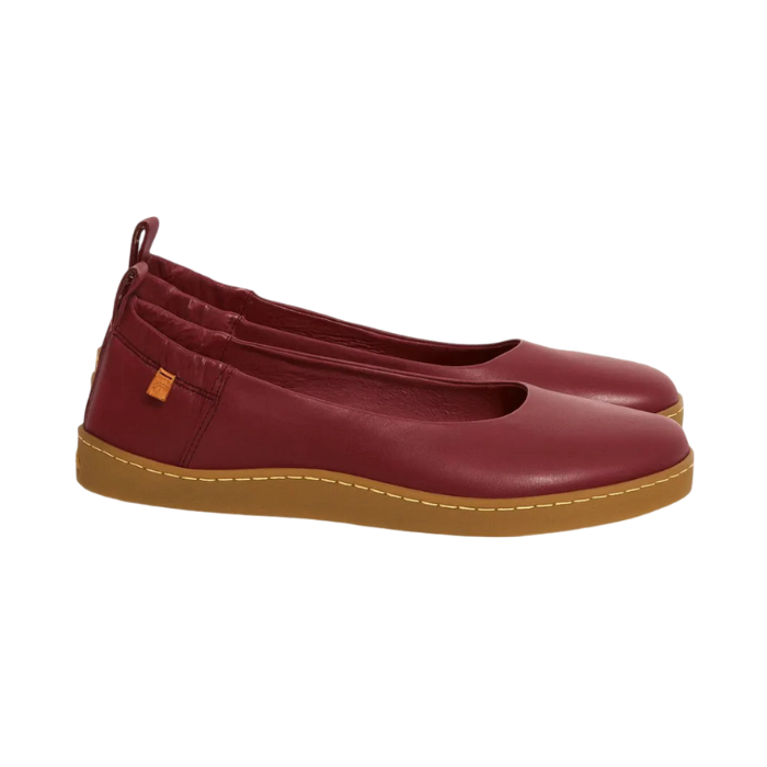 Pair of burgundy ballet flats with heel tab, and tan outsole