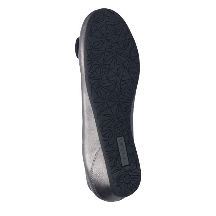 Black geometric designed tread of ballet flat with Josef Seibel logo stamped on heel.