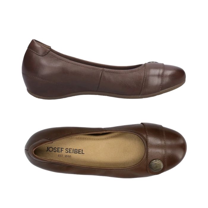 Pair of Ballet flat shoes in cognac leather with a decorative strap and  bronze button on the toe, tan Josef Seibel logo'd footbed and brown outsole.