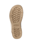 Tan outsole with deep tread pattern and Keen logo stamped in middle.