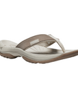 Beige thong sandal with rugged outsole.