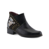 A black leather ankle boot with a low block heel, gold-tone studs on the side and a floral-patterned heel panel.