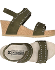 Pair of Green backstrap cork wedge sandals with silver stud design on straps, tan Mephisto logo'd footbed and beige outsole.