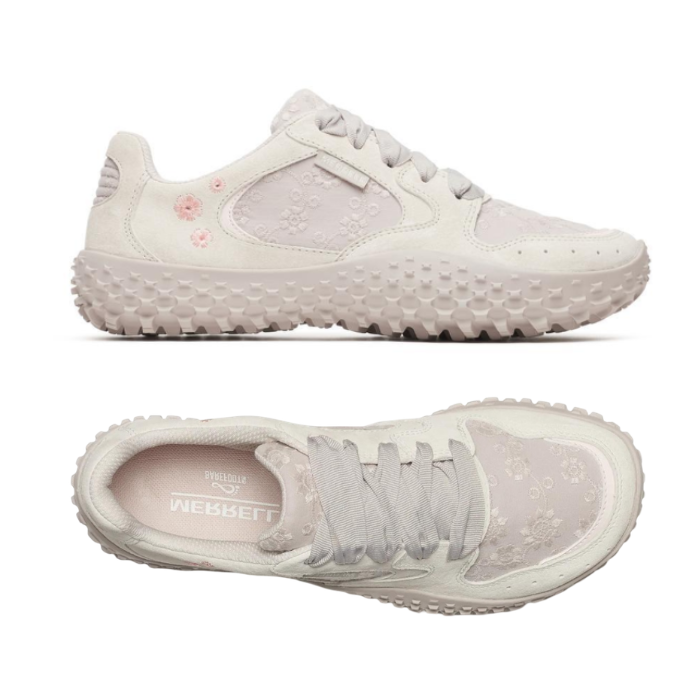 Pair of Grey sneakers with pink embroidery flowers, lace panel accents, ribbon lacesm pink Merrel and Barefoot logo'd footbed and a deep tread soft pink outsole.