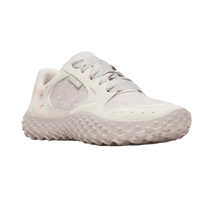 Grey sneaker with pink embroidery flowers, lace panel accents, ribbon laces and a deep tread soft pink outsole.