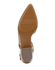 Beige outsole with light tread and Naturalizer logo stamped in middle by low block heel.
