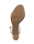 Light treaded block heel outsole with Naturalizer logo in middle.