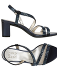 Pair of navy satin block heel sandals with rhinestone straps and Naturalizer logo'd footbed.