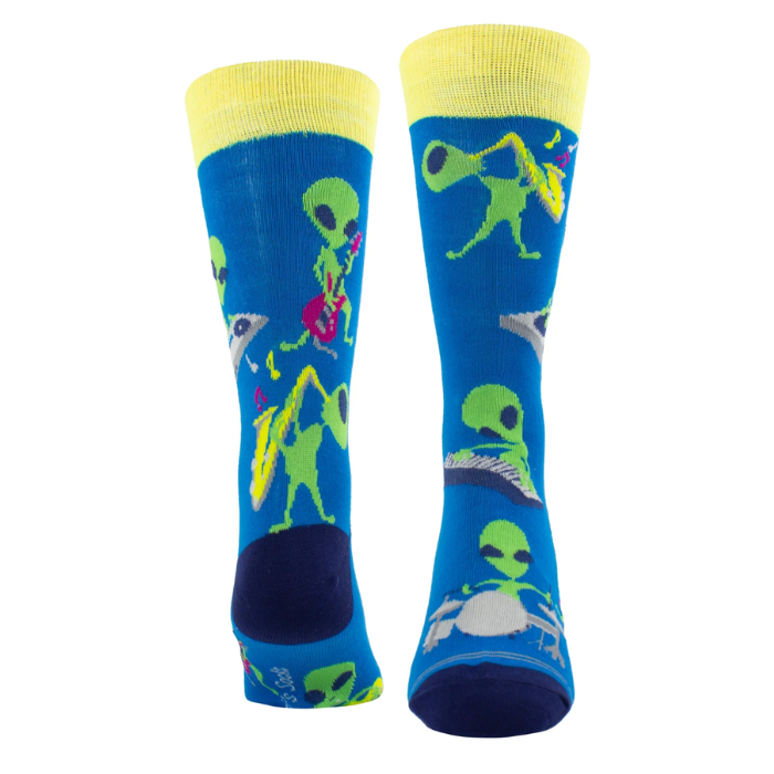 Pair of Blue socks with aliens playing instruments, yellow cuff and dark navy heel and toe cap.