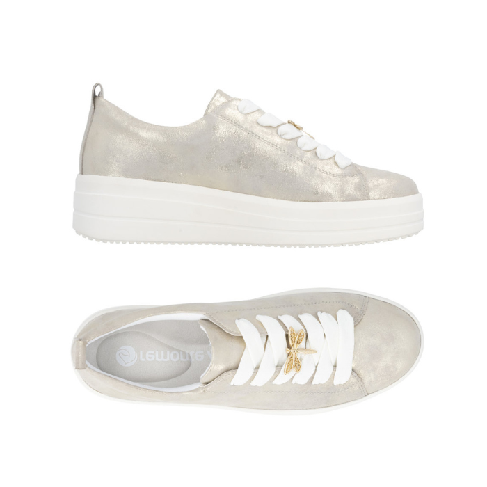 Pair of Dusted gold sneakers with white laces, gold dragonfly lace charm, grey Remonte logo'd footbed and white platform outsole.