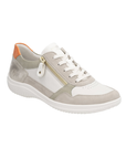 Beige sneaker with green, orange and taupe accents, laces, side zipper, and white light treaded outsole.