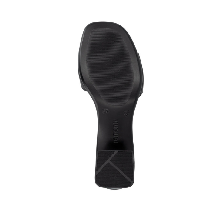 Black light treaded outsole of block heel sandal with Remonte logo stamped in middle.
