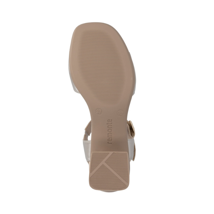Tan light treaded outsole with Remonte logo near block heel.