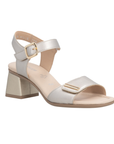 Gold block heel sandal with gold accents on Velcro Straps, tan Remonte logo'd footbed and beige outsole.
