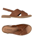 Pair of Brown slingback sandals with a silver buckle, a knot design over vamp, tan Remonte logo'd footbed and flat rubber outsole.