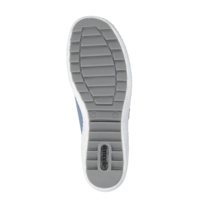 Grey treaded outsole of sneaker with green Remonte logo on heel.