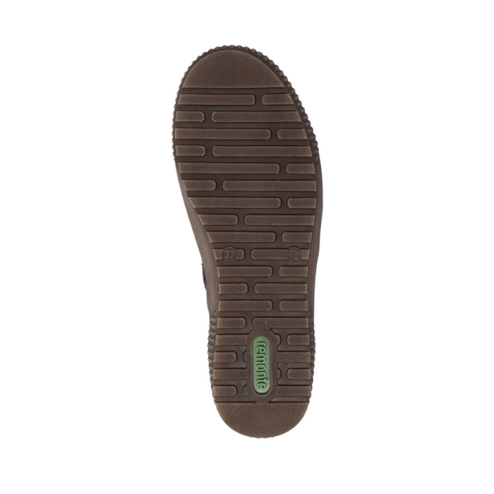 Brown line patterned tread of Remonte ankle boot outsole, with green logo at heel.