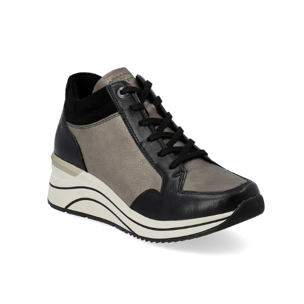 Gold Lace-up wedge sneakers have black laces, gold and black portions on the uppers. The wedge midsole is white with black wave lines and the outsole is black 