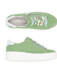 Top and side views of green Remonte D1C06 women's platform sneakers featuring vibrant laces and a convenient side zipper.