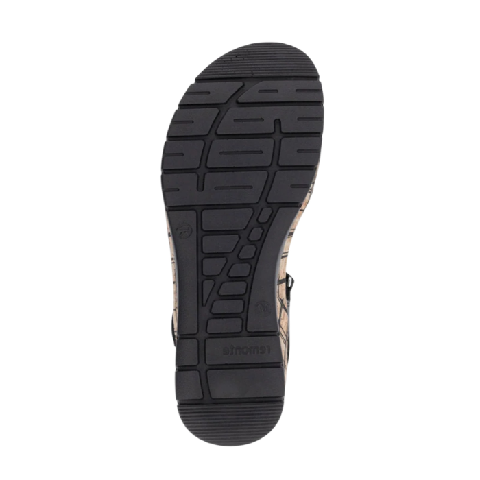 Black treaded outsole of sandal with Remonte logo stamped at heel.
