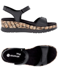 A black backstrap platform wedge sandals with a cork-textured midsole, black Remonte logo'd footbed and black outsole.