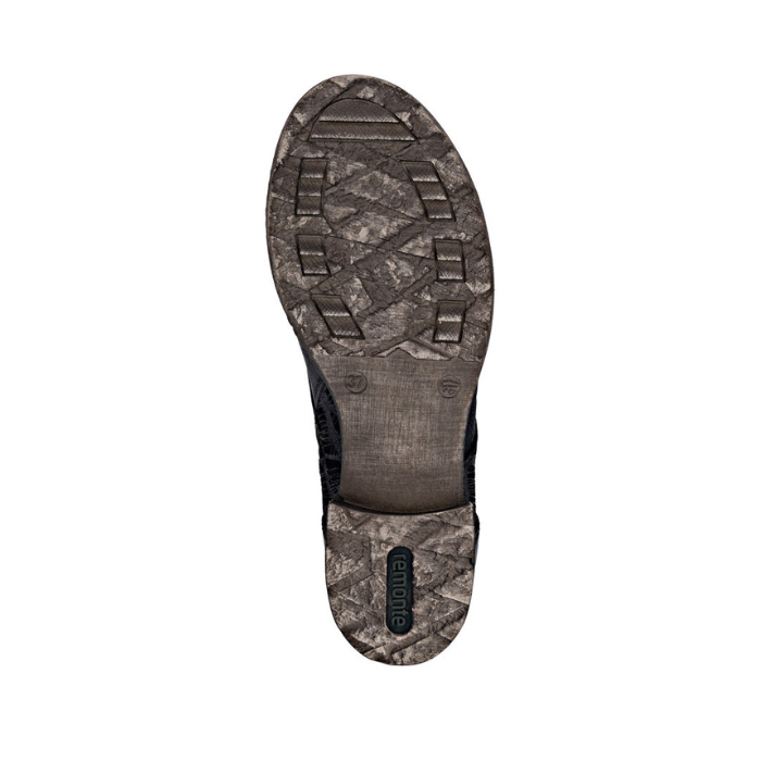 Tan light treaded outsole with green Remonte logo on heel.