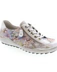 A grey lace-up sneaker with floral pattern a side zipper, white laces and lugged grey outsole.