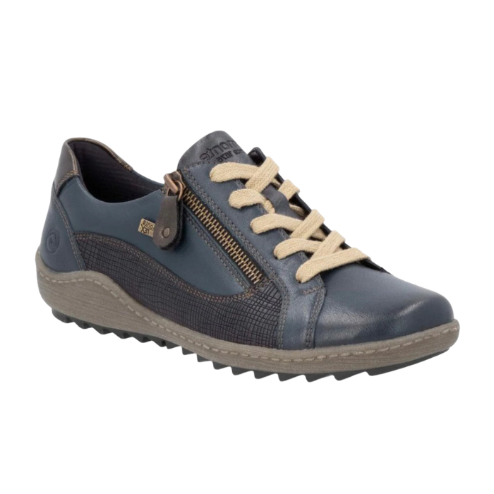 Blue sneaker with beige laces, side zipper, textured accents, grey midsole and black lugged outsole.