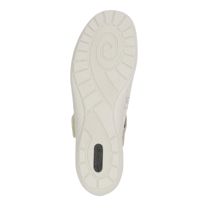 White light treaded outsole with spiral pattern and green Remonte logo at heel.