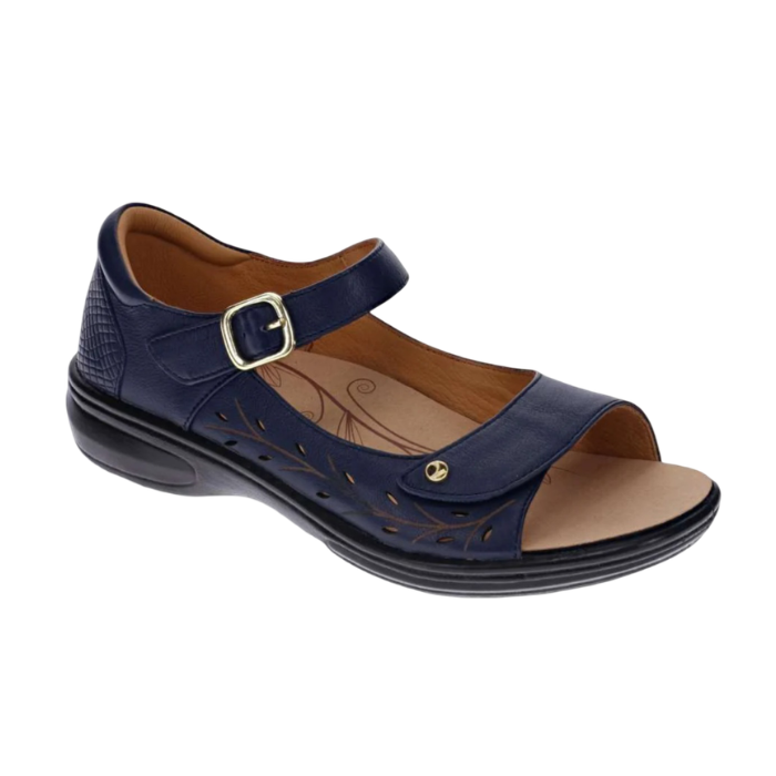 Navy blue floral perforated design on side of sandal with a gold buckle accent on Velcro strap, closed side and back, tan Revere logo'd footbed and black outsole.