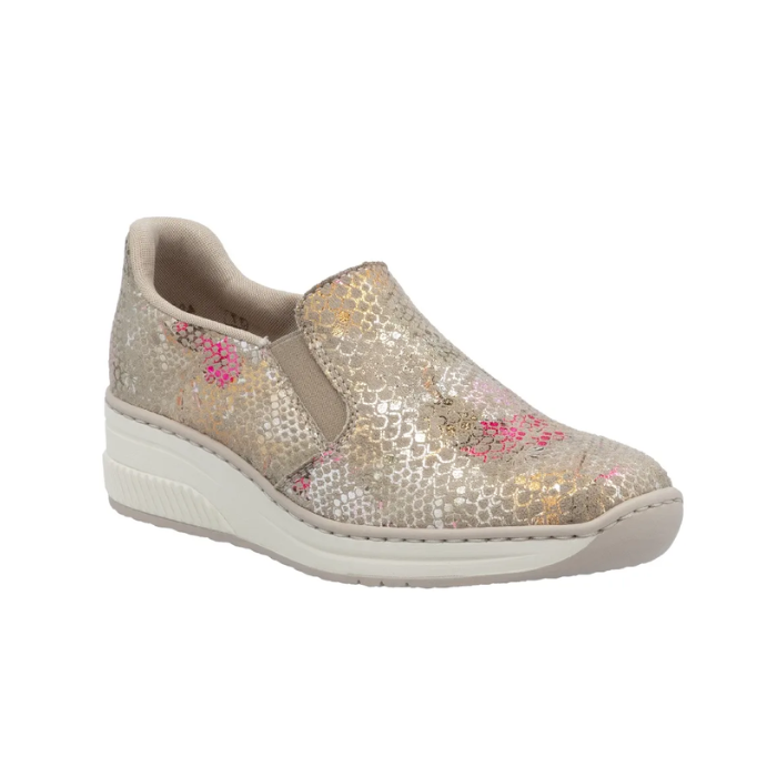 Women's Rieker 48761 Slip-On Shoe in beige with floral accents and wedge heel, ideal for lightweight comfort and shock absorption.