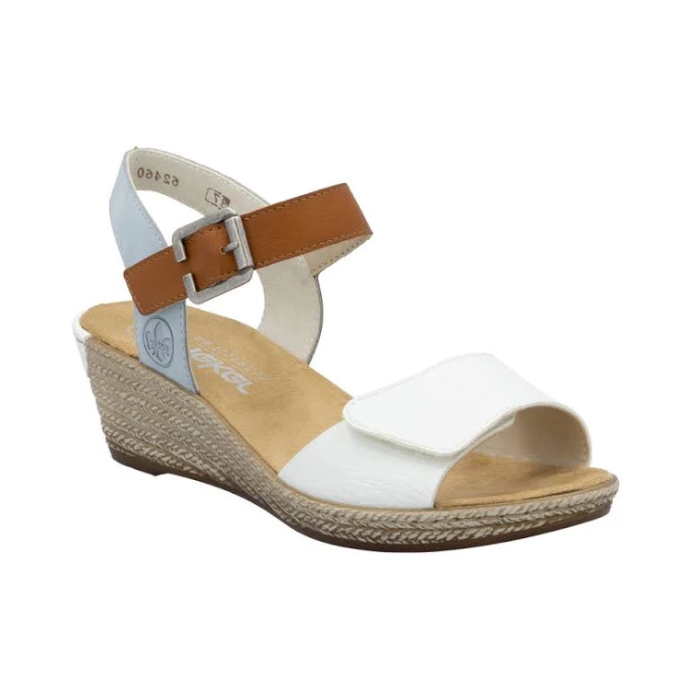 Rieker sling back wedge with blue back strap, brown buckle strap, white velcro toe strap, beige logo'd footbed and tan textured midsole.