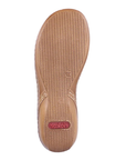 Tan light treaded outsole on sandal with red Rieker logo stamped on heel.