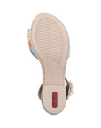 Tan block heel outsole with light tread and red Rieker logo on heel.
