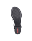 Light treaded outsole of block heel sandal with Rieker logo on base of heel in red.
