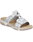 Floral-patterned slide sandal with Velcro straps, Rieker tan footbed and beige and white outsole.