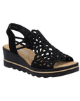 Black caged backstrap sandal with rhinestone details, tan Rieker logo'd footbed and a wedge heel.