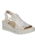 Beige caged backstrap sandal with rhinestone details, tan Rieker logo'd footbed and a wedge heel.