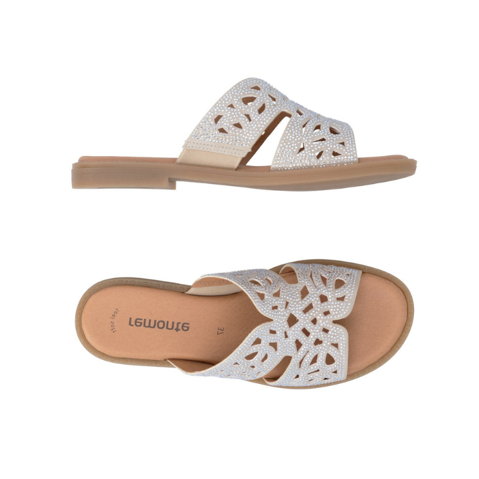 Pair of Beige slide sandals with perforations through rhinestone covered straps, tan Remonte logo'd footbed and tan flat outsole.