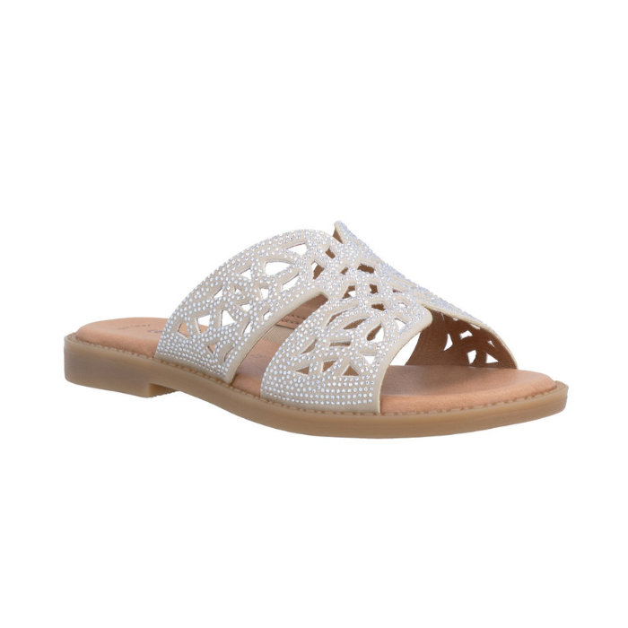 Beige slide sandal with perforations through rhinestone covered straps, tan Remonte logo'd footbed and tan flat outsole.