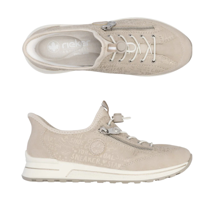 Pair of Beige sneakers with white bungee lacing, pale shimmery wording accents over upper and a grey outsole.