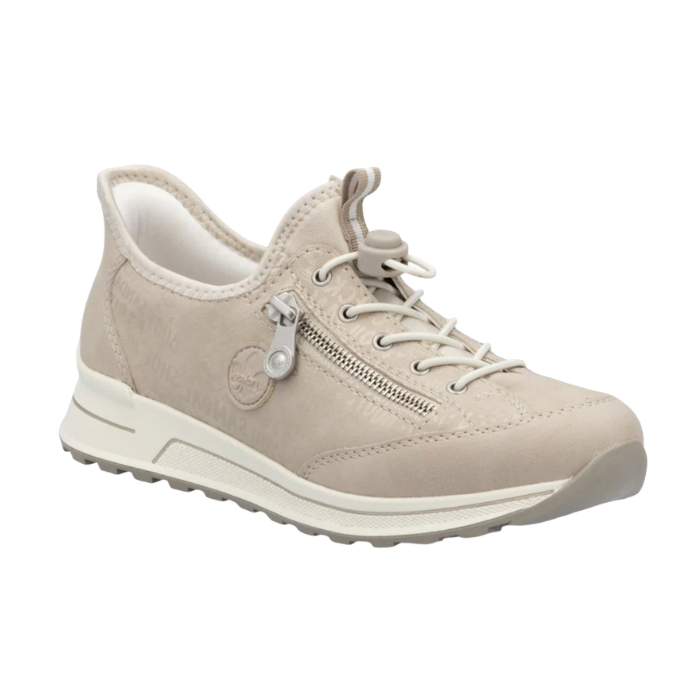 Beige sneaker with white bungee lacing, pale shimmery wording accents over upper and a grey outsole.