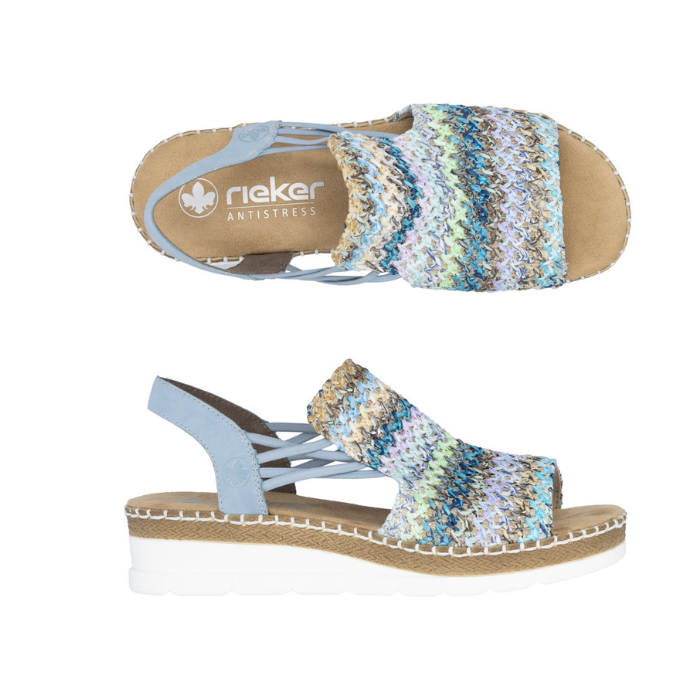 Pair of Wedge backstrap sandals in blue with green, beige and gold woven into the upper, elastic sides, tan Rieker logo'd footbed and white outsole.