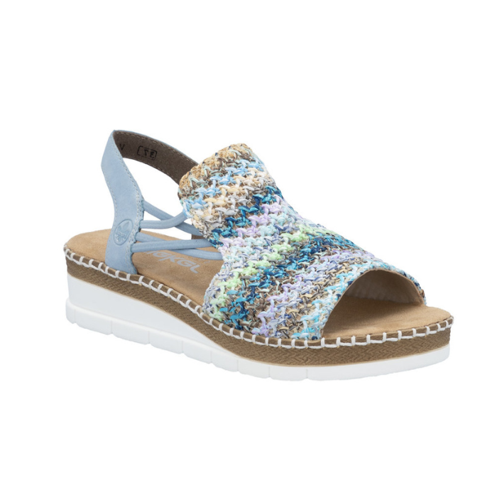 Wedge backstrap sandal in blue with green, beige and gold woven into the upper, elastic sides and white outsole.