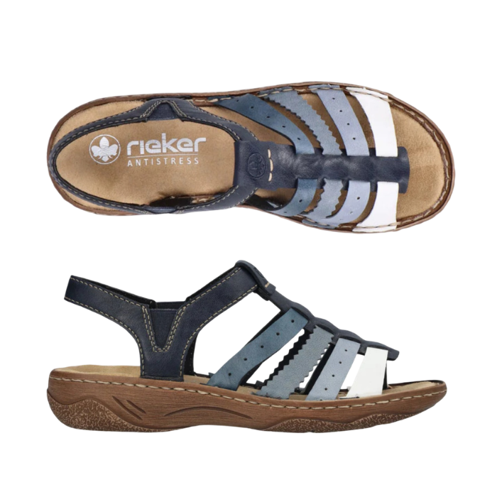 Pair of Navy blue sandals with fading lighter blue straps, gladiator style upper, tan Rieker logo'd footbed and brown outsole.
