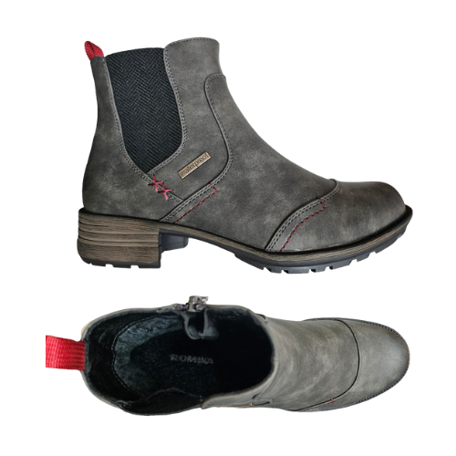 Pair of Grey Chelsea boots with red heel tab, red accent stitching, light fur lining and low heel.