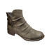 Brown ankle boot with ruching upper, side decorative buckle and low heel.
